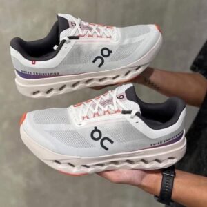 Alternative view of ON Cloudd surfers Next running trainers in white and red